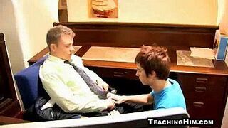 Hot stud sucking on a hard cock at the office - porn video